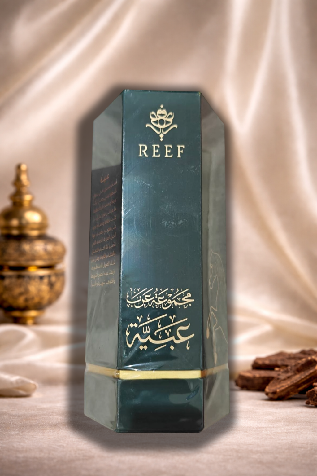 Arab Obaiah perfume styled with oud wood and luxury Arabian background aesthetic.