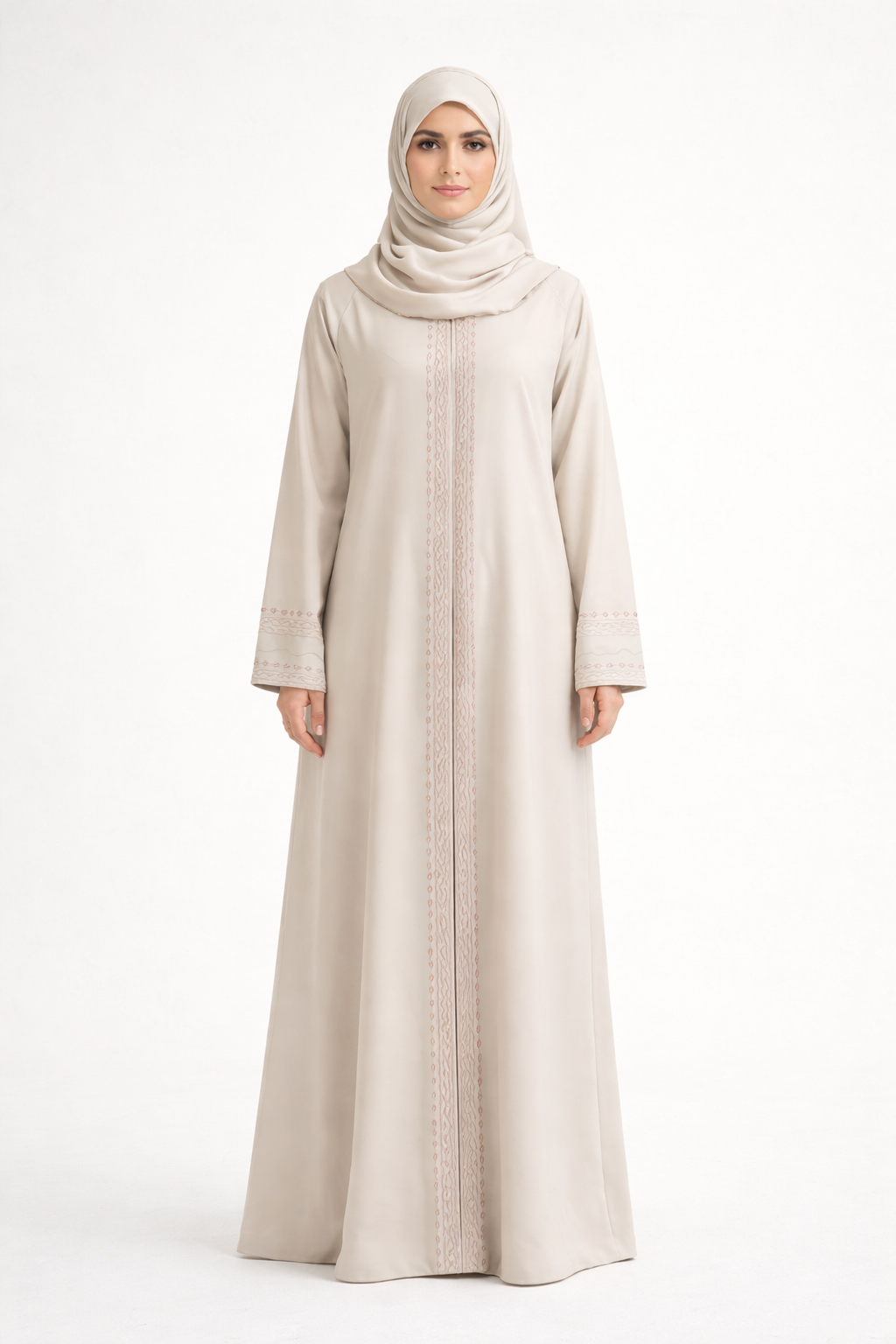 Cream Barbie & Reem style abaya with box collar and embroidered cuffs, full-length front view (model facing camera).