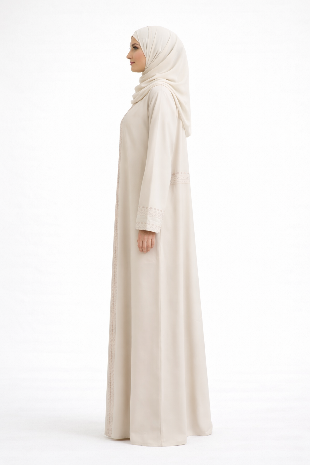 Cream Barbie & Reem style abaya with box collar and embroidered cuffs, full-length side profile view (opposite side).