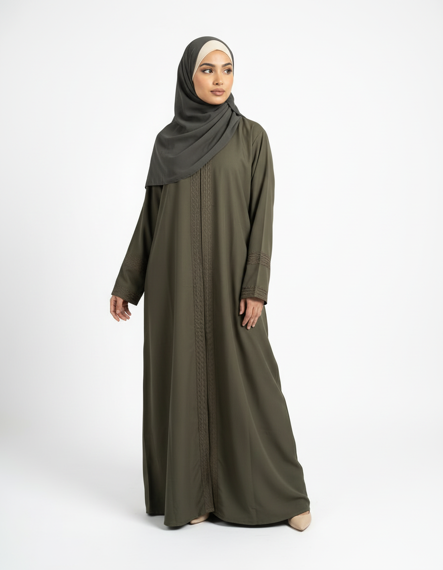 Front angled view of olive green Barbie & Reem style abaya showing movement and flowy silhouette.