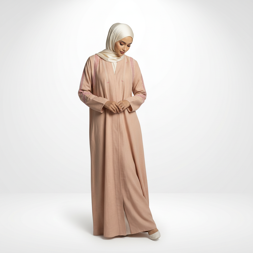 Pink linen embroidered abaya with zigzag detailing, cream hijab, angled view (looking down).