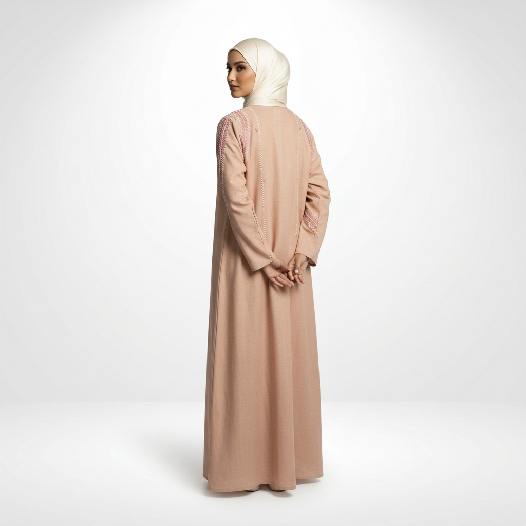 Pink linen embroidered abaya with zigzag detailing, cream hijab, full-length back view.
