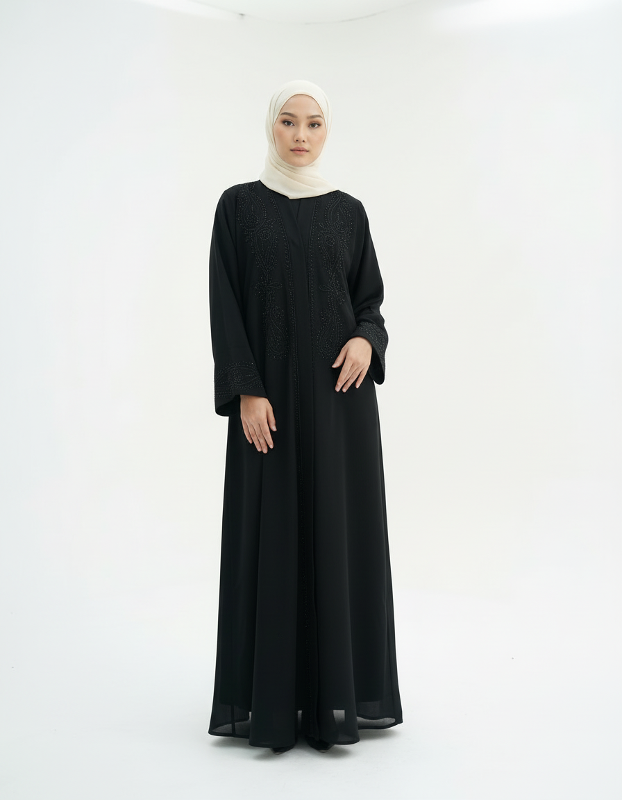 Full-length front pose with relaxed arm position, black abaya and cream hijab, studio white background.
